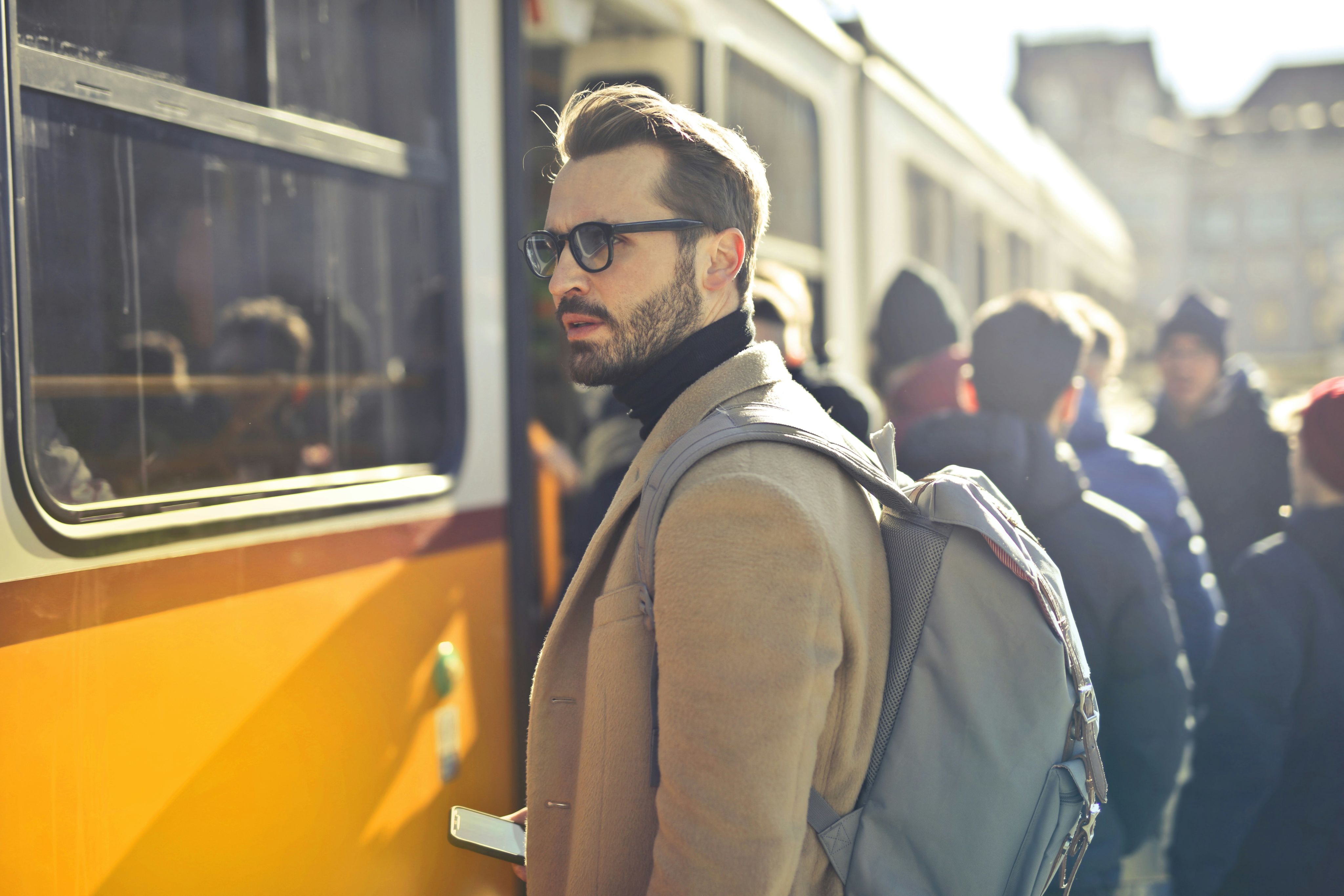 tilt-shift photography of man. Photo by bruce mars on Unsplash