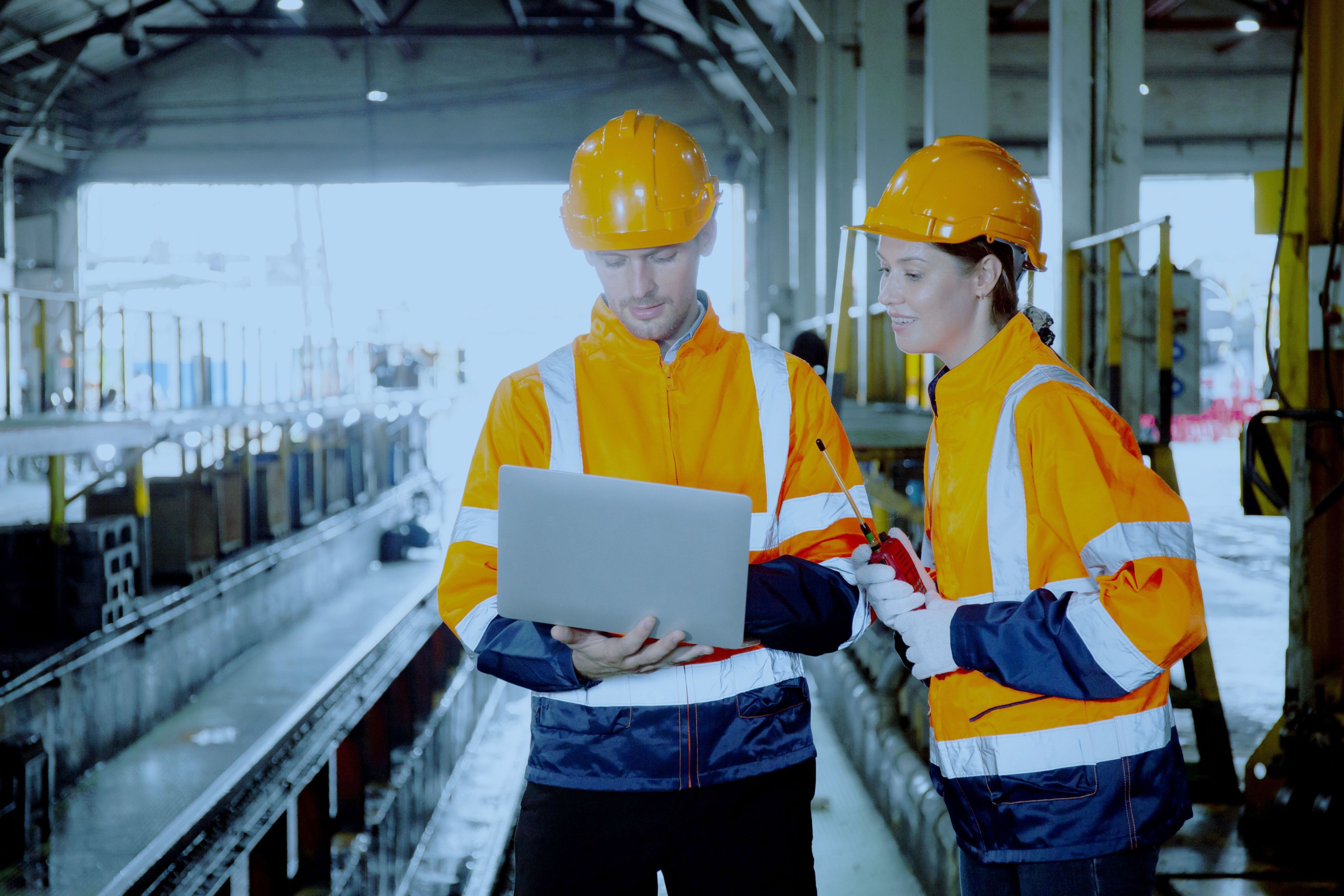 Male and female Caucasian engine ers checking train lines using laptop - Copyright - NT_studio / Adobe Stock