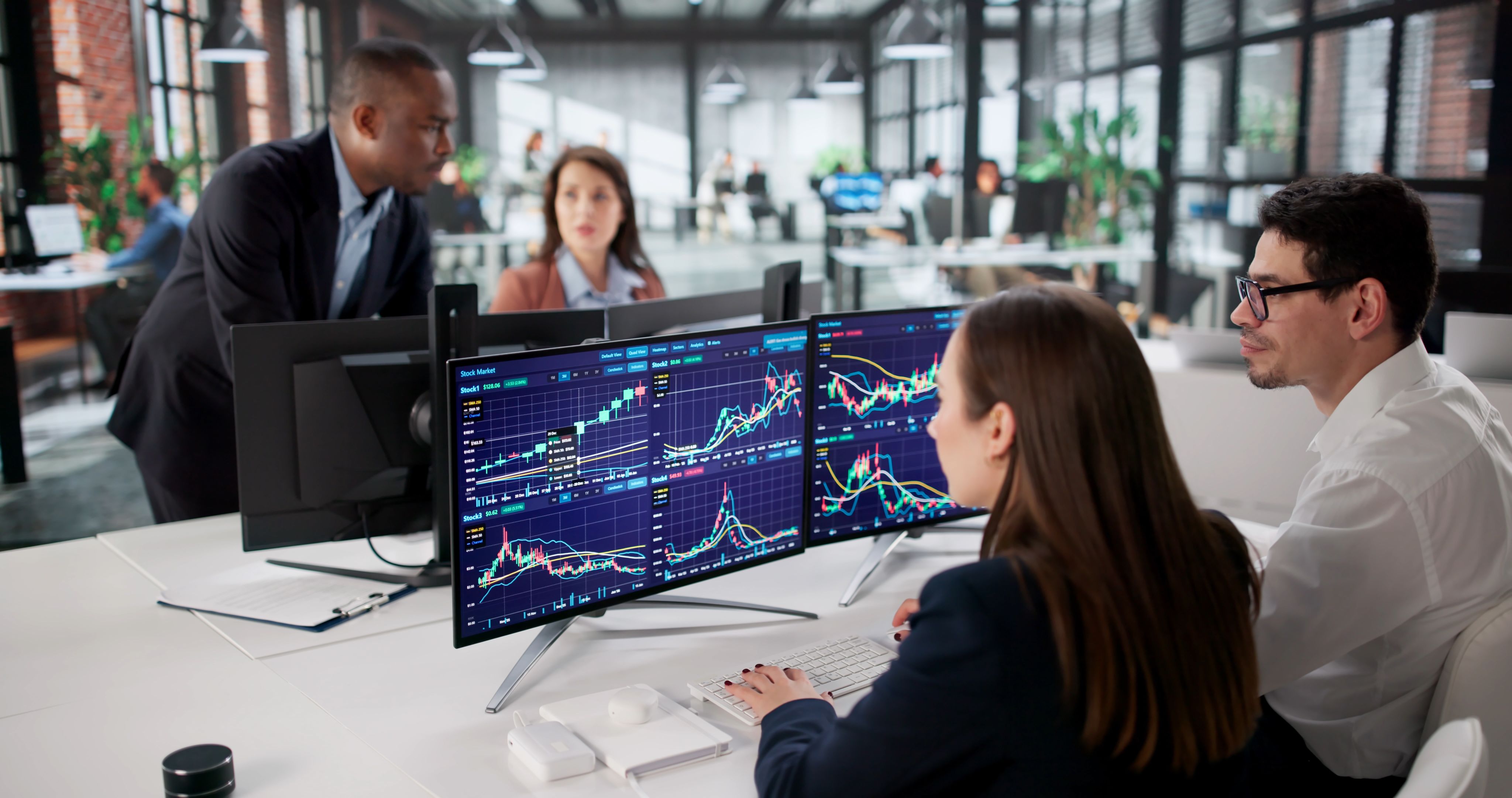 Mixed group of stockbrokers - Copyright - Andrey Popov / Adobe Stock